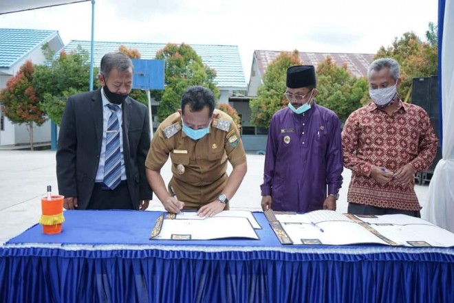 Wabup BBS Hadiri Launching Mobil Esemka MU-COE SMK Muhammadiyah Sungai Bahar dan Penandatanganan MoU dengan PT Agung Toyota Jambi.